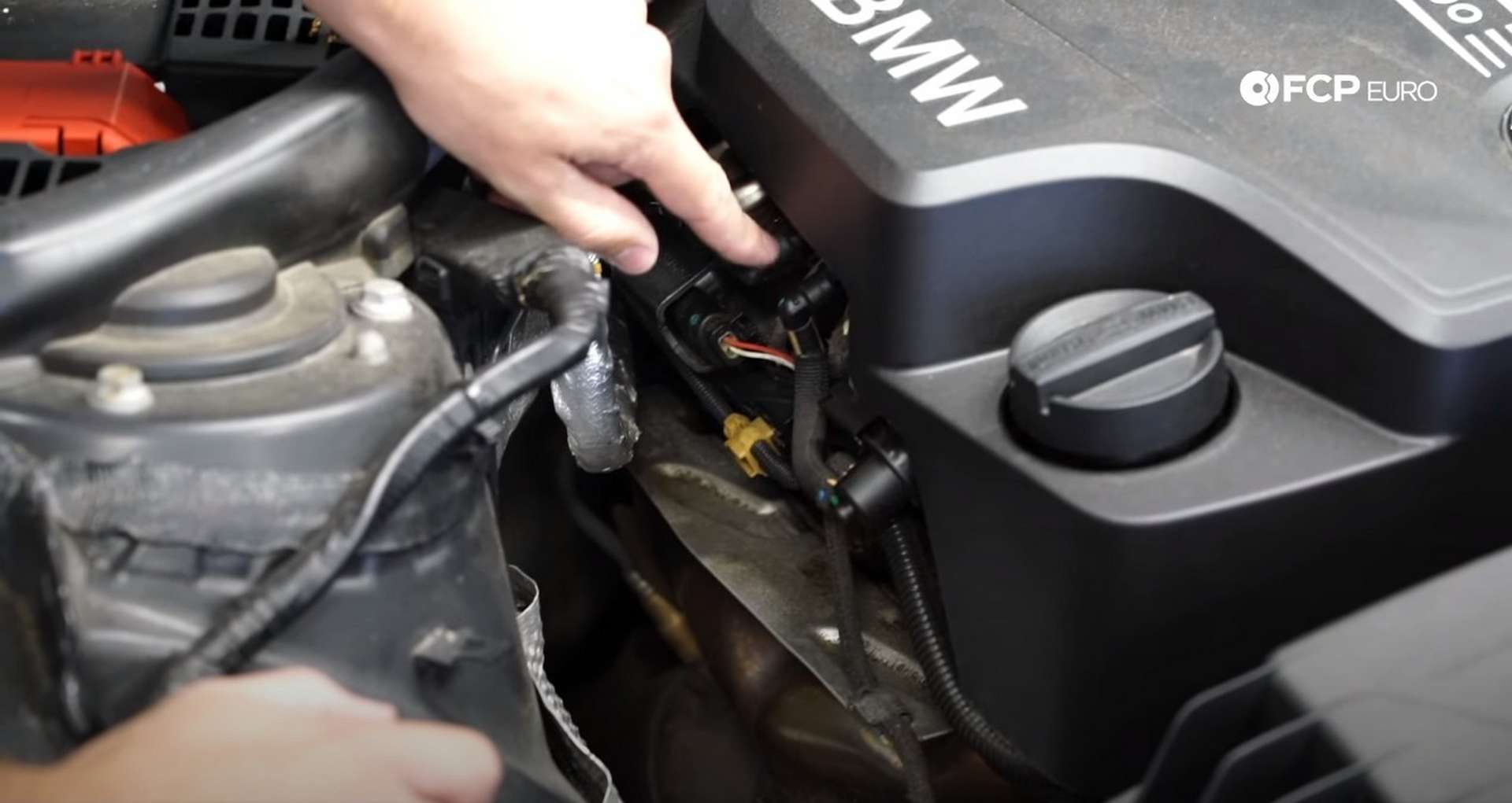 DIY BMW N20 Vacuum Pump removing the engine cover’s vacuum lines