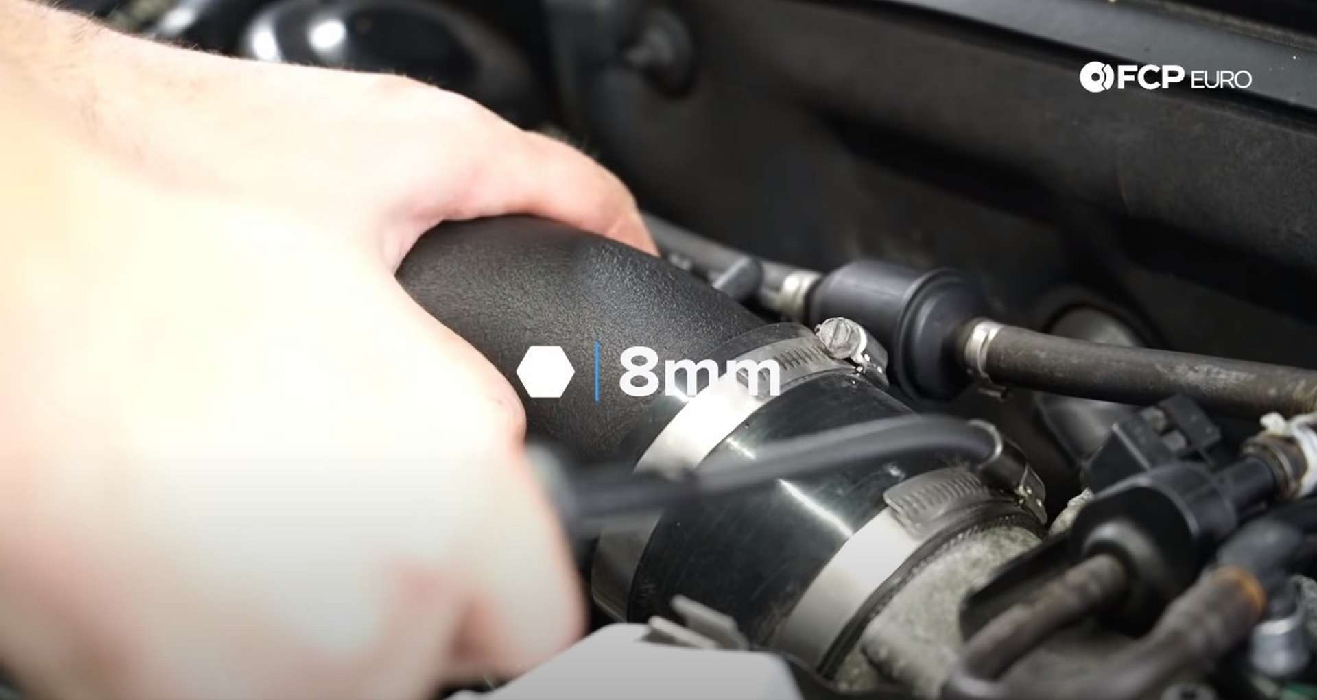 DIY Audi 3.0T Supercharger Oil Change tightening the intake hose clamps