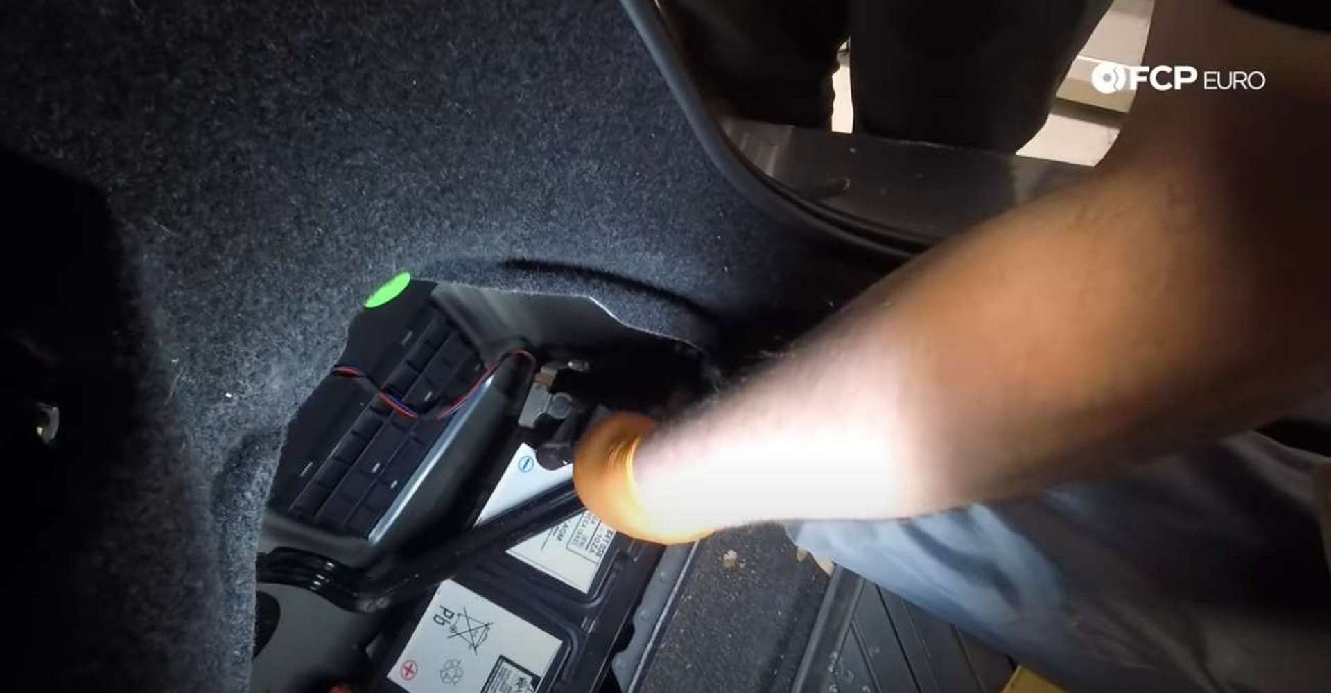 DIY BMW F30 Oil Filter Housing Gasket Replacement loosening the negative battery cable connection