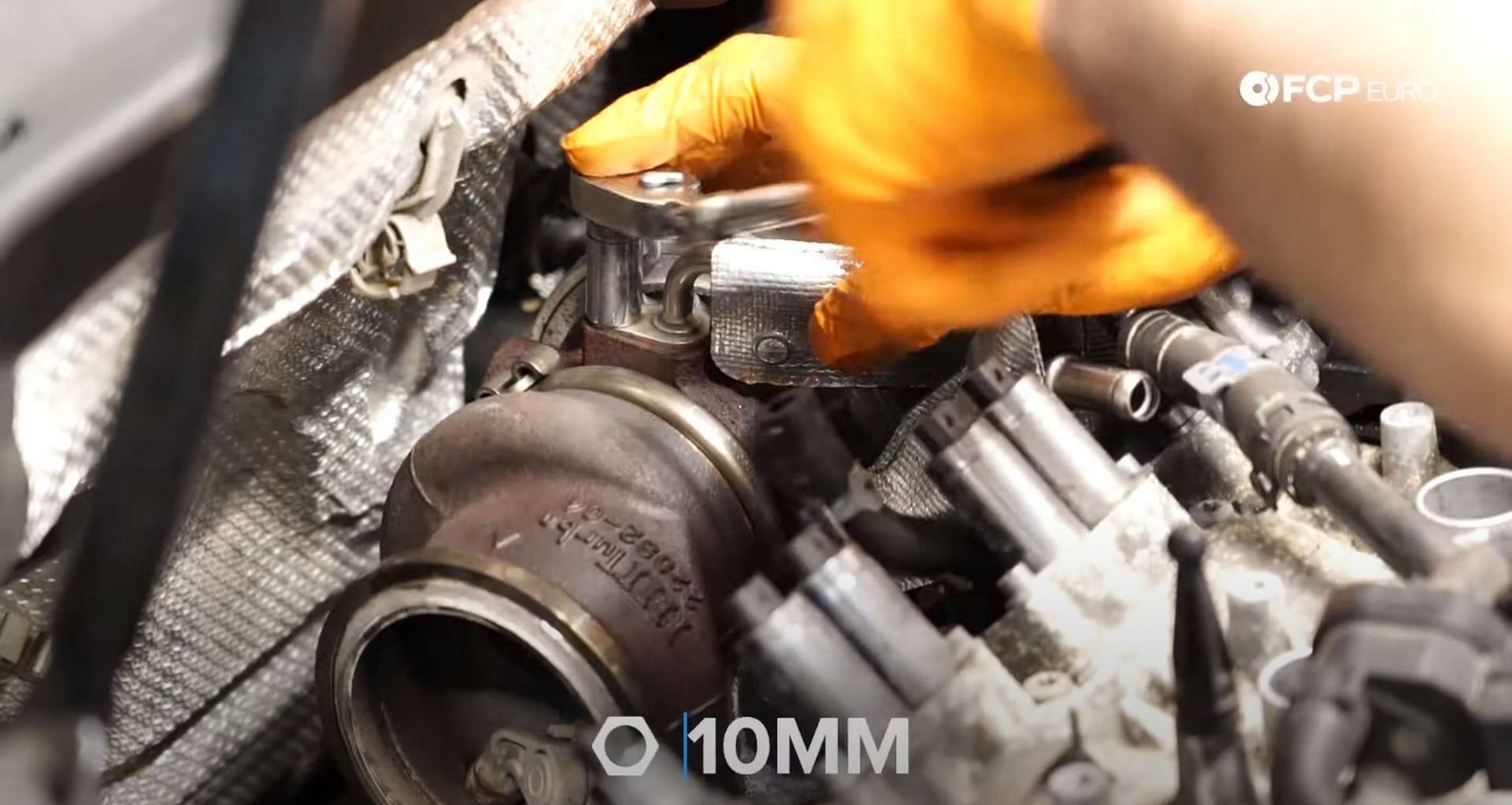 DIY MK7 VW GTI Turbocharger Upgrade removing oil feed line stud