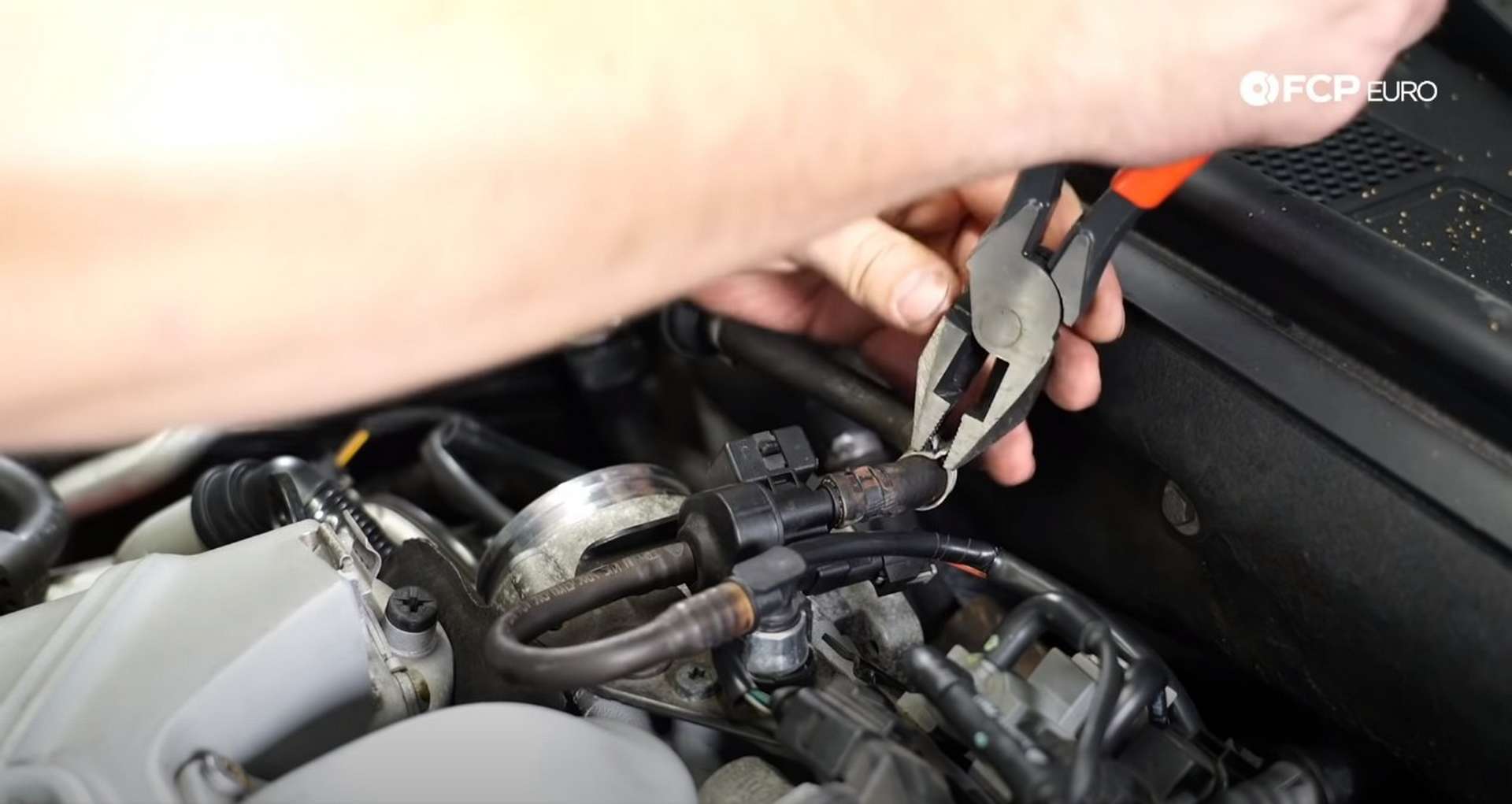 DIY Audi 3.0T Supercharger Oil Change attaching the evap line
