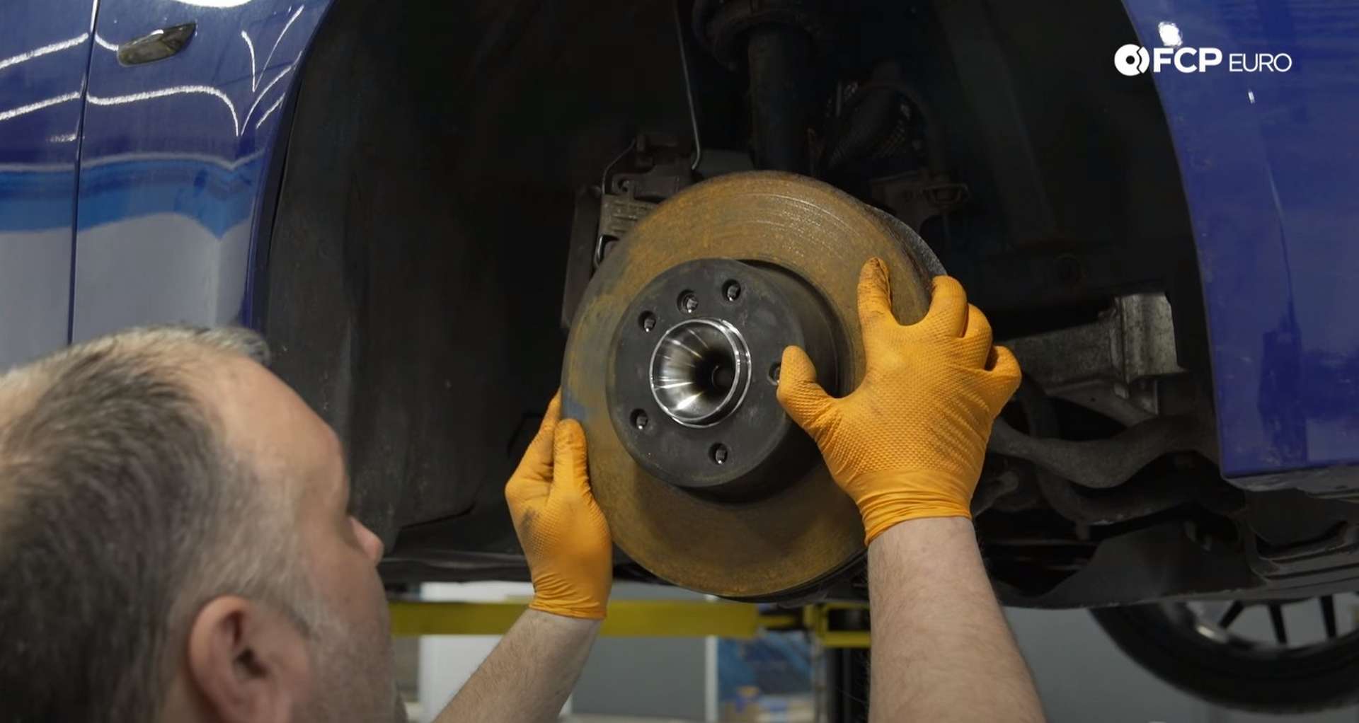 DIY BMW E9X Wheel Bearing Replacement refitting the brake rotor