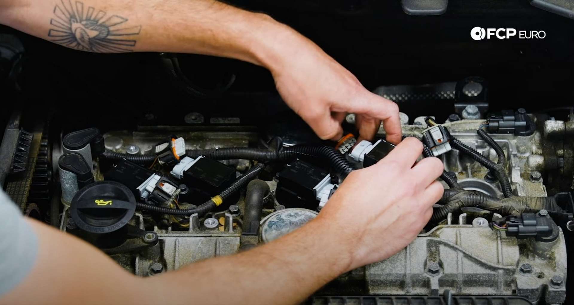DIY Volvo Spark Plug and Ignition Coil Replacement installing the ignition coil]