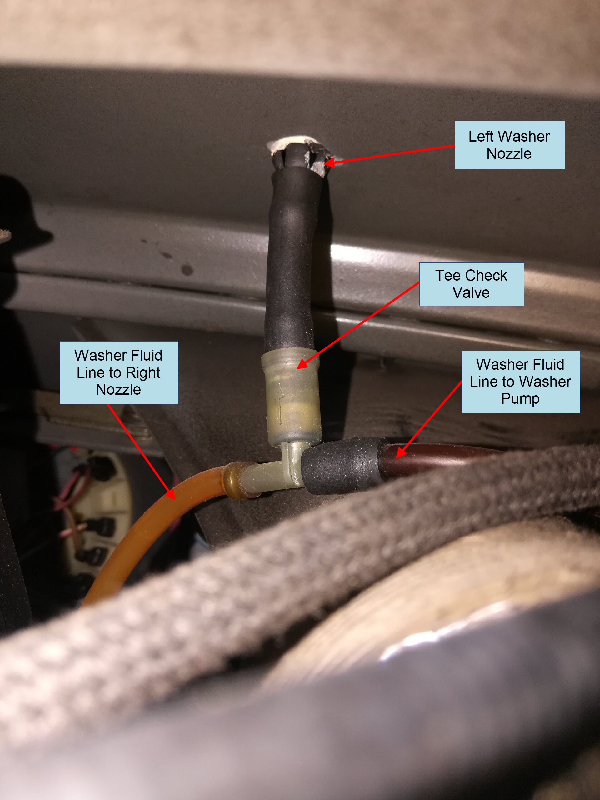 Air-cooled Porsche 911 left windshield washer nozzle removal
