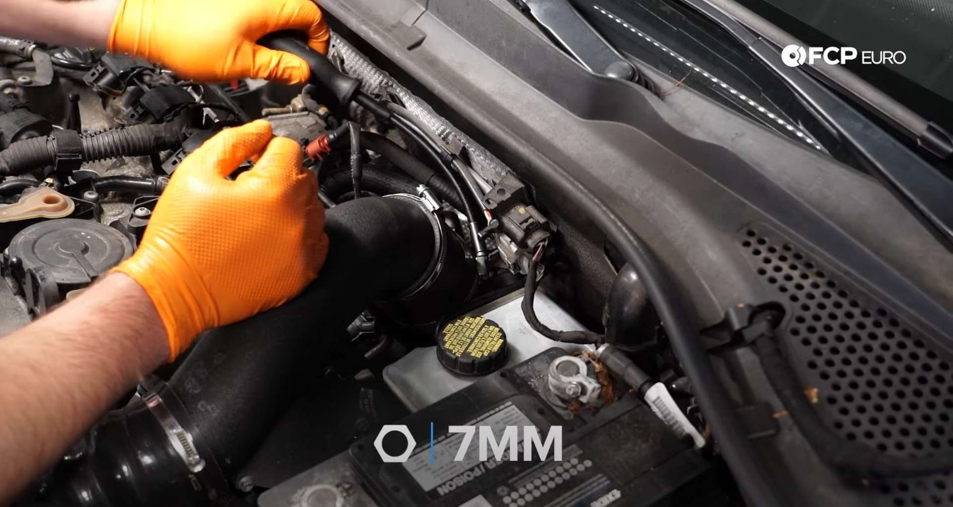 DIY MK7 VW GTI Turbocharger Upgrade loosening the intake clamp