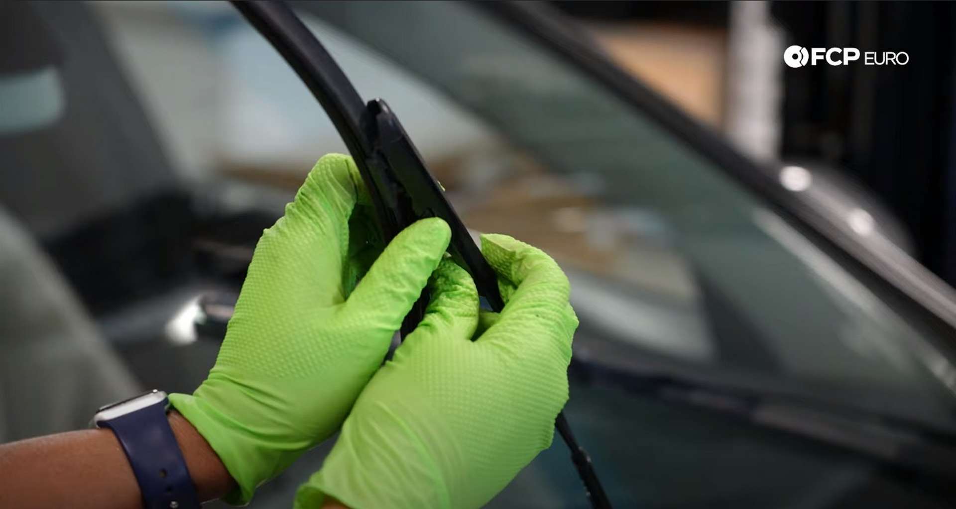 DIY Mercedes-Benz W205 Wiper Blade Replacement pressing the tabs to release the arm
