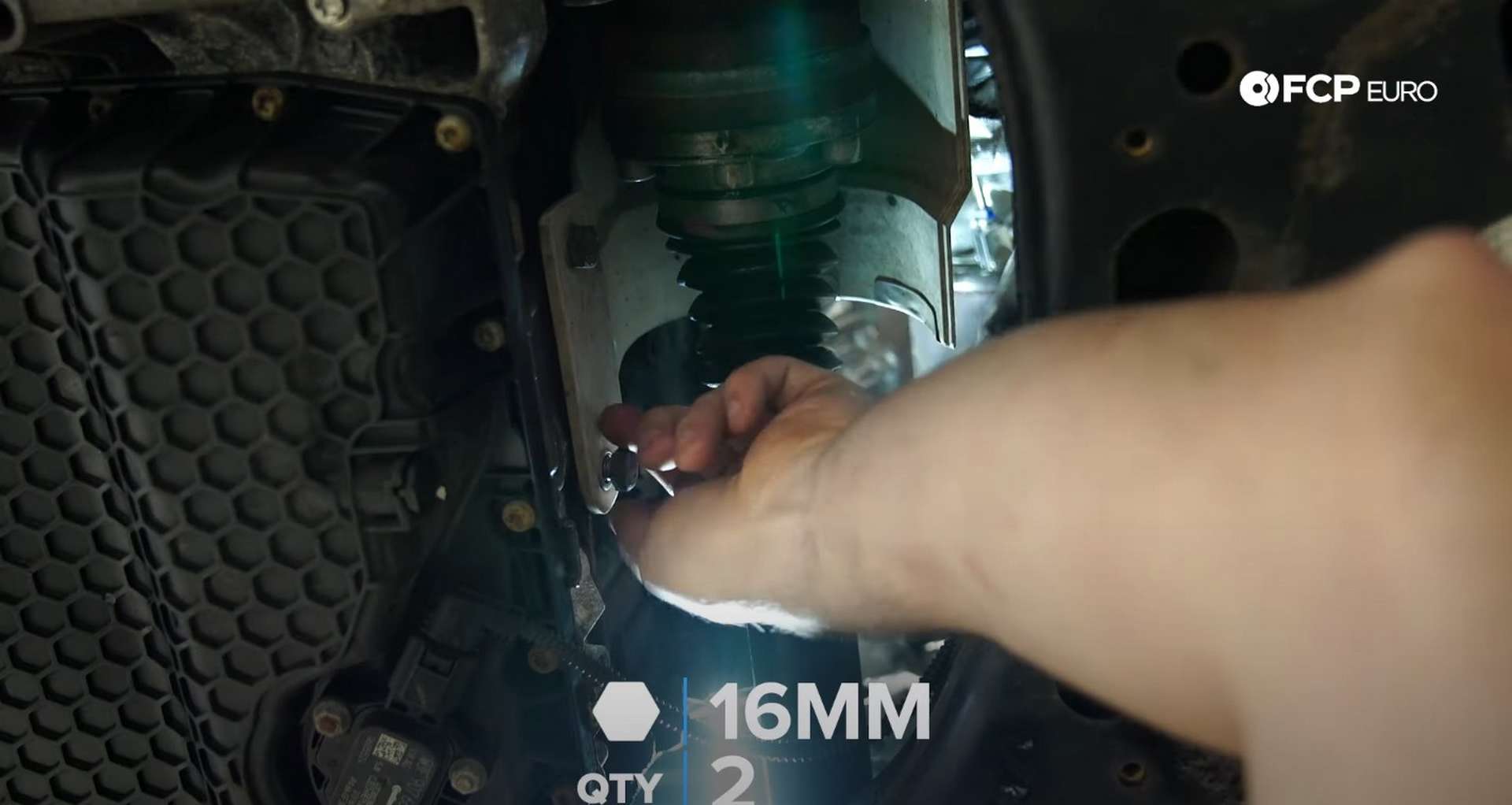 DIY MK7 VW GTI Turbocharger Upgrade installing the axle’s heat shield