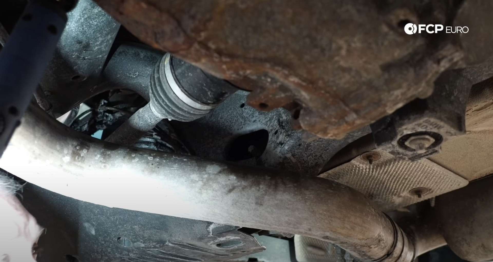 DIY BMW F30 Rear Control Arm Replacement toe link inner bolt head