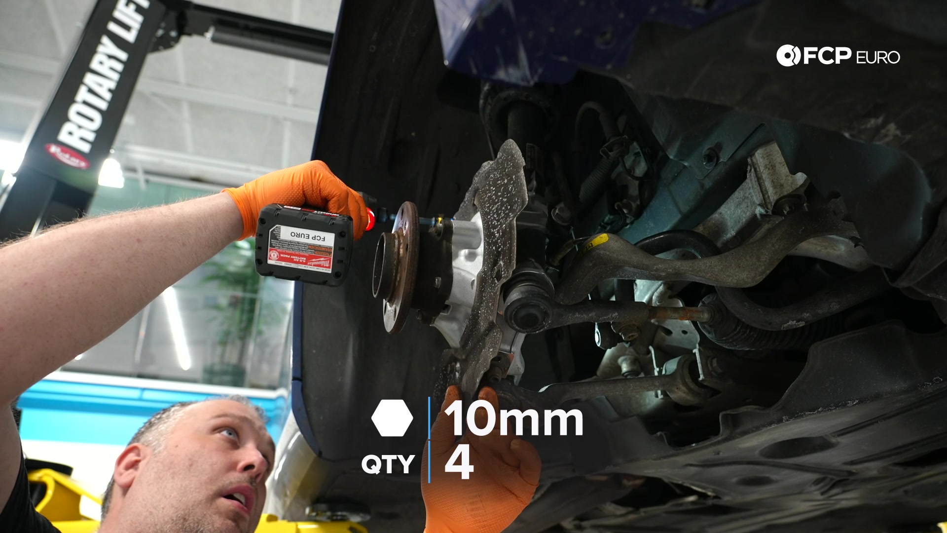 DIY BMW E90 Steering Knuckle Replacement tightening the dust shield’s bolts