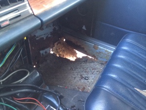 The first section of rusted floor pan that broke away on my 1976 300D.
