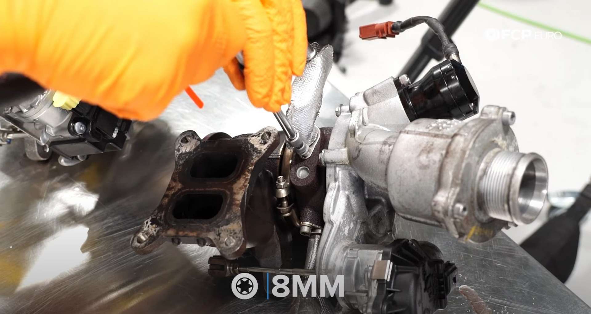DIY MK7 VW GTI Turbocharger Upgrade removing the coolant return line fitting