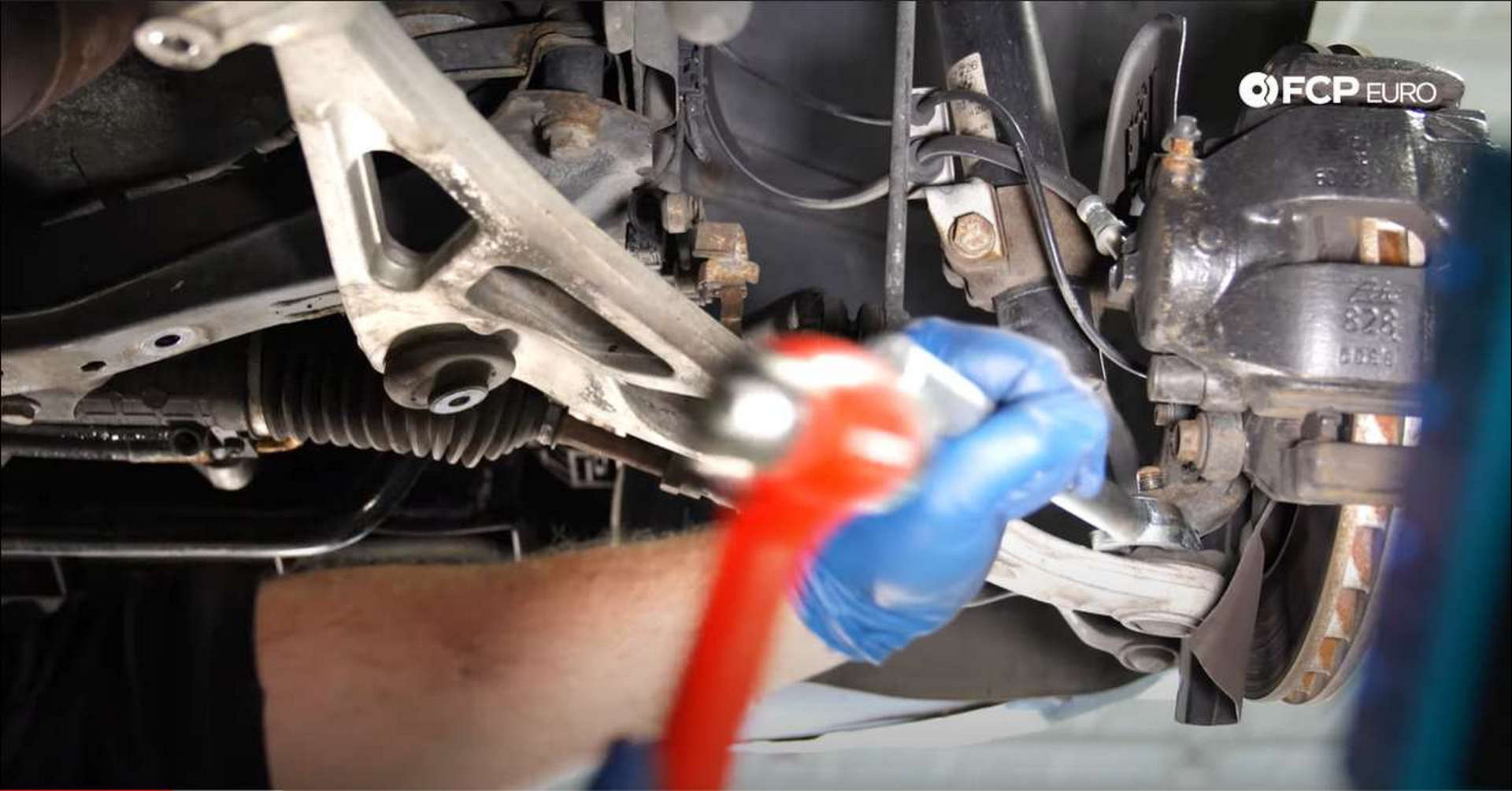 DIY BMW Front Suspension Refresh separating the ball joint and knuckle