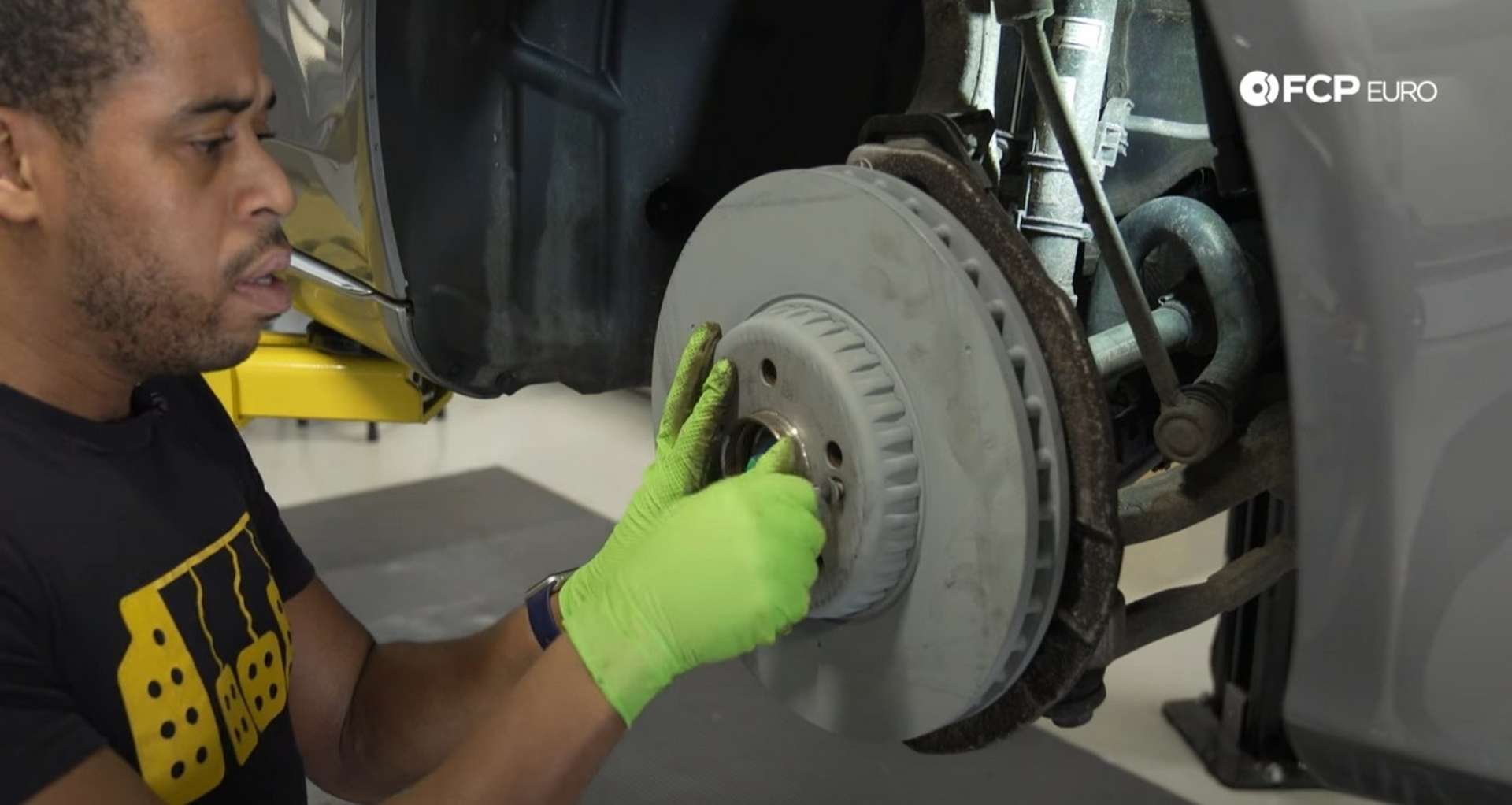 DIY Mercedes-Benz W205 Front Brake Service installing the new rotor and set screw