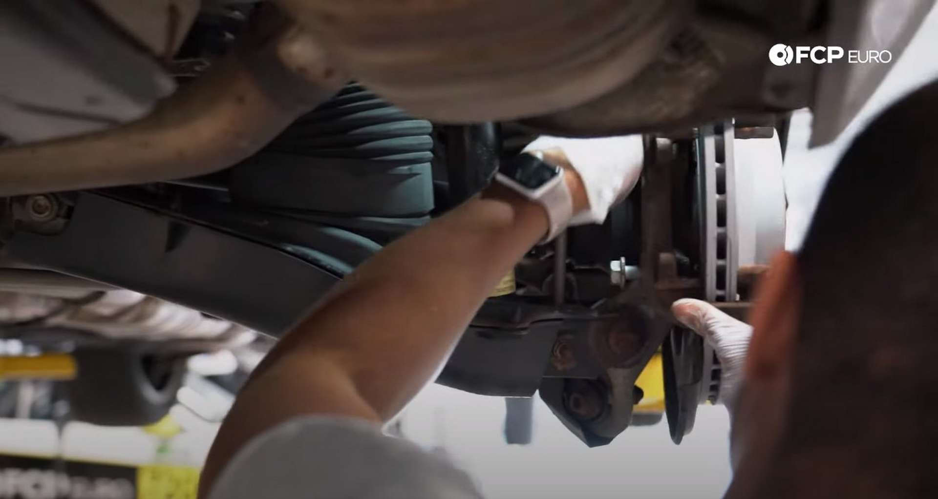 DIY Mercedes W211/212 Rear Brake Job reinstalling the caliper bracket