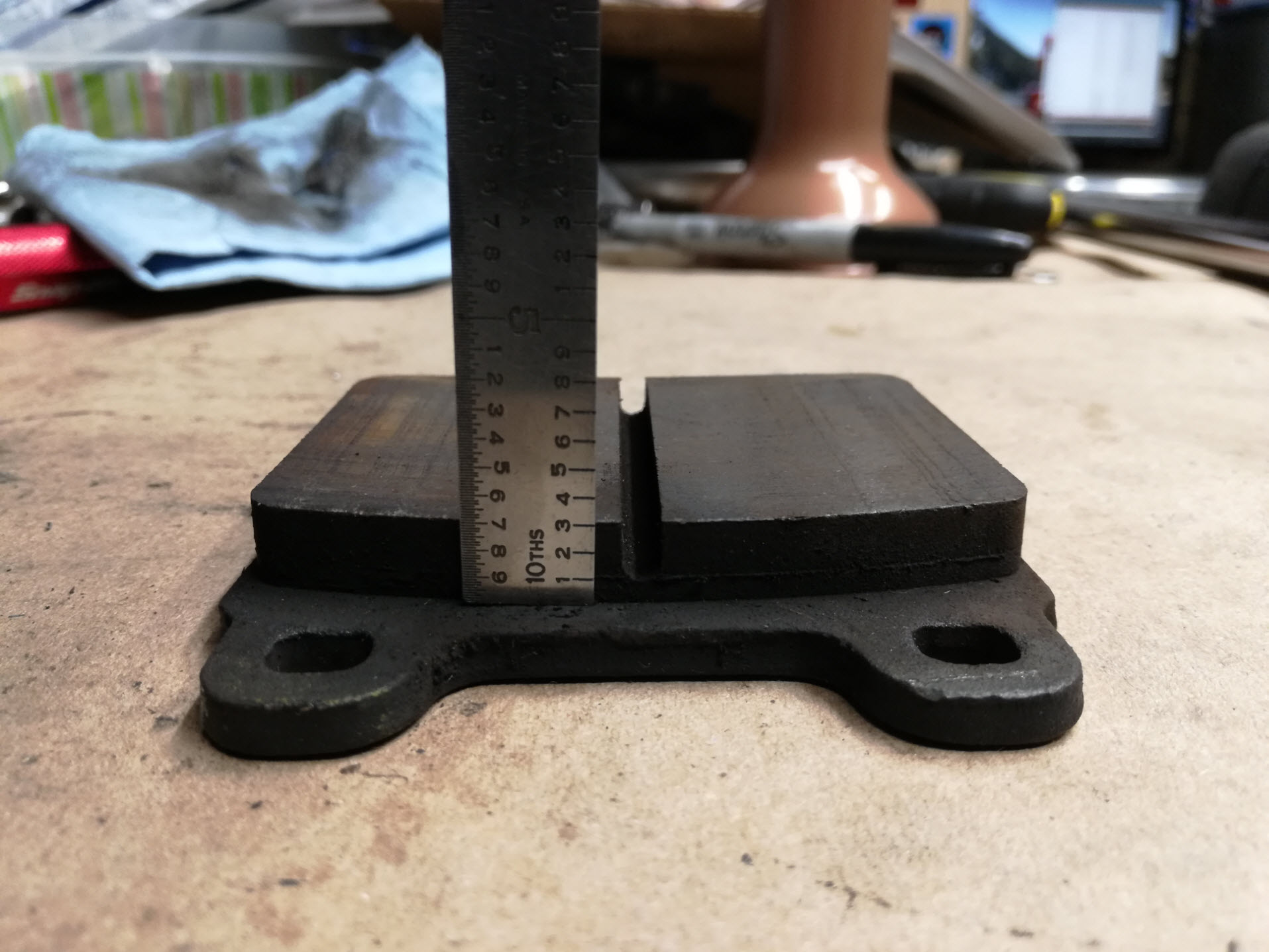 Air-cooled Porsche 911 brake pad material thickness.
