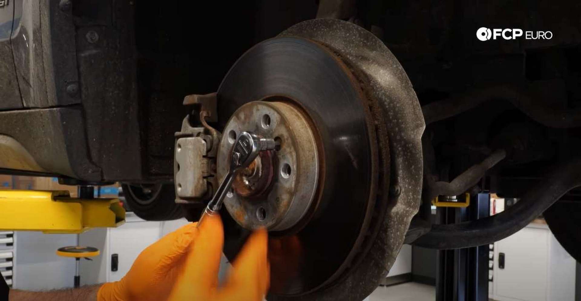 DIY BMW F15 X5 F16 X6 Brake Service removing the rotor's set screw