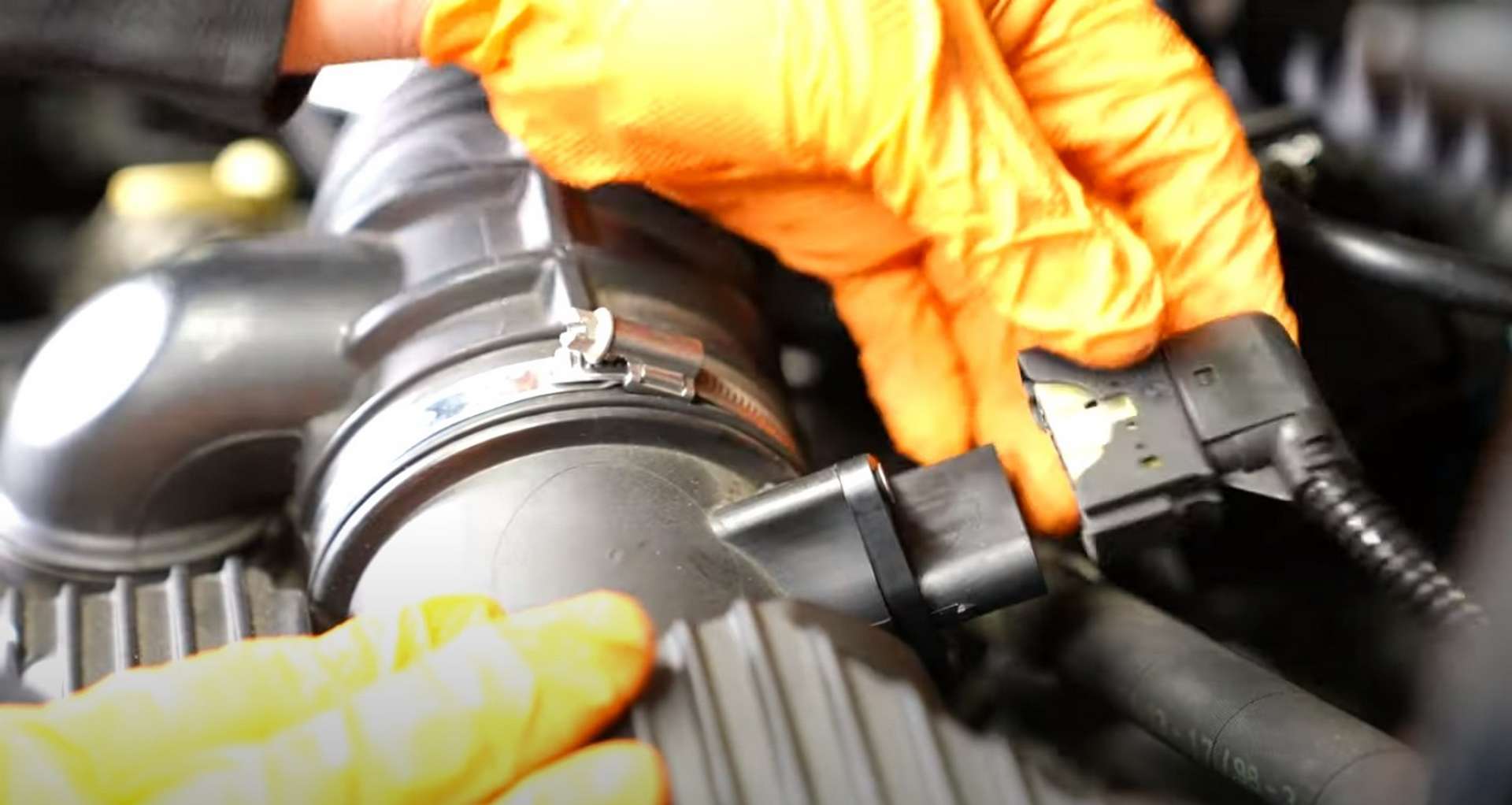 Porsche 996 Engine Mount Replacement removing the oil filler neck from the airbox