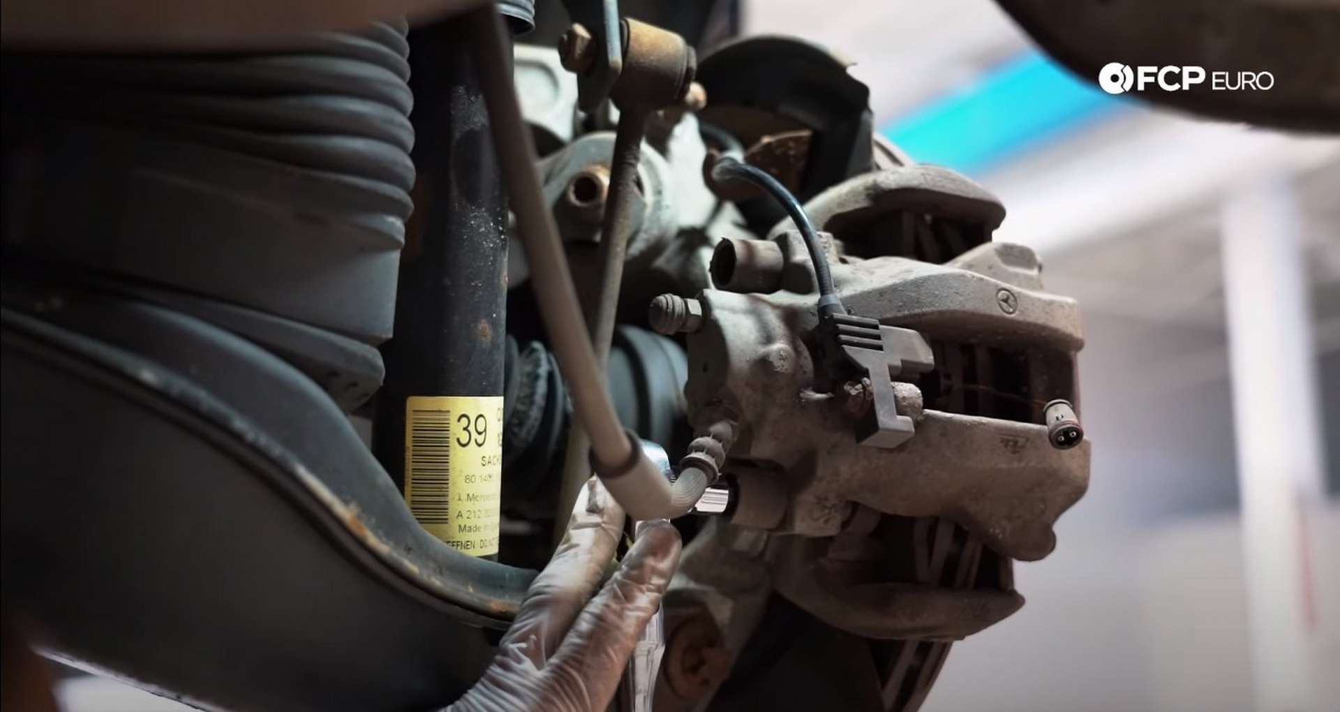 DIY Mercedes W211/212 Rear Brake Job removing the caliper guide pins