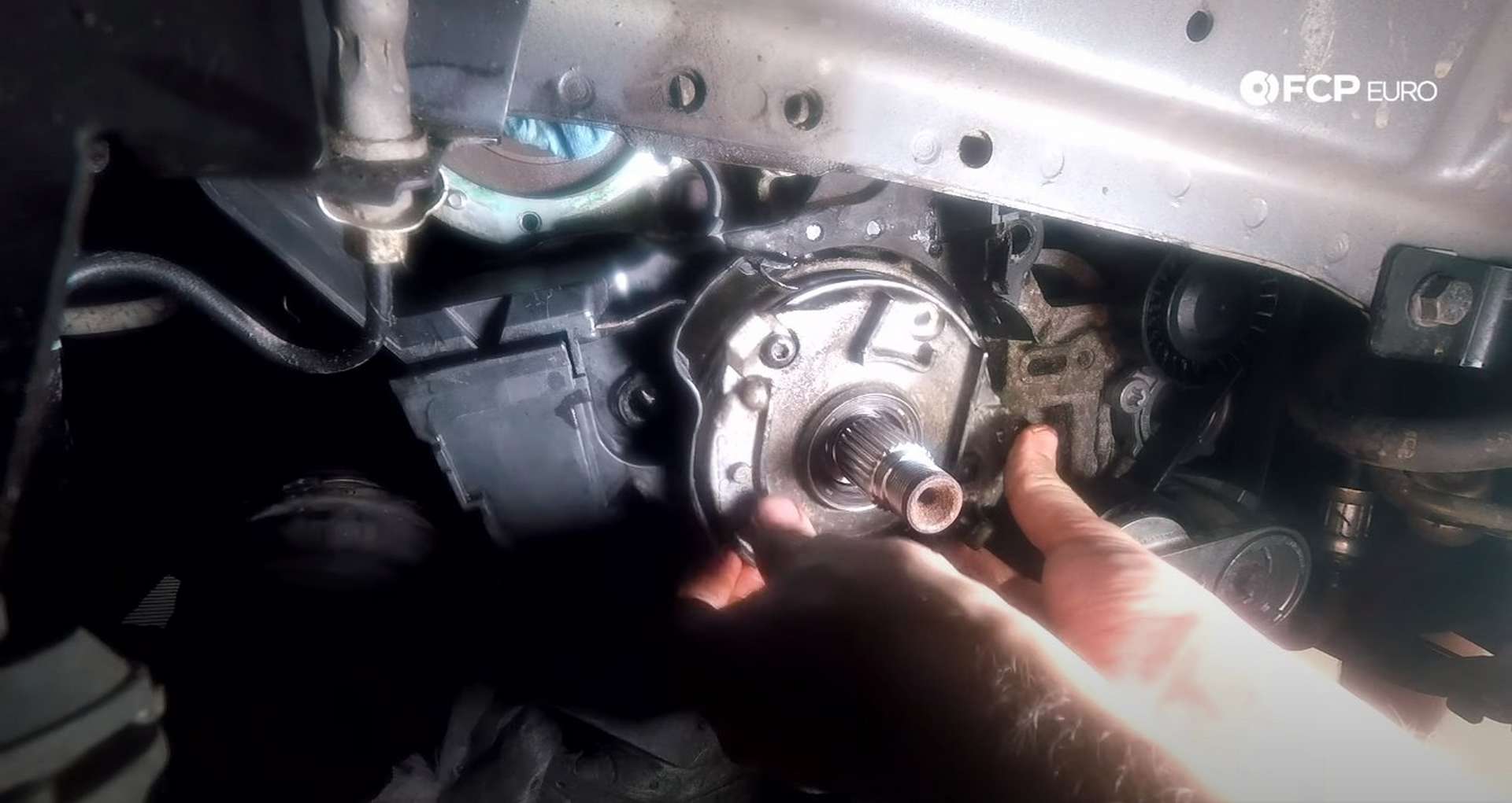DIY Volvo P1 Timing Belt Replacement installing the new oil pump