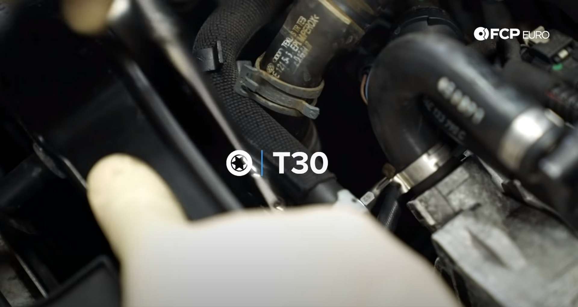 DIY Audi 3.0T Supercharger Oil Change removing coolant hose mounting bolt