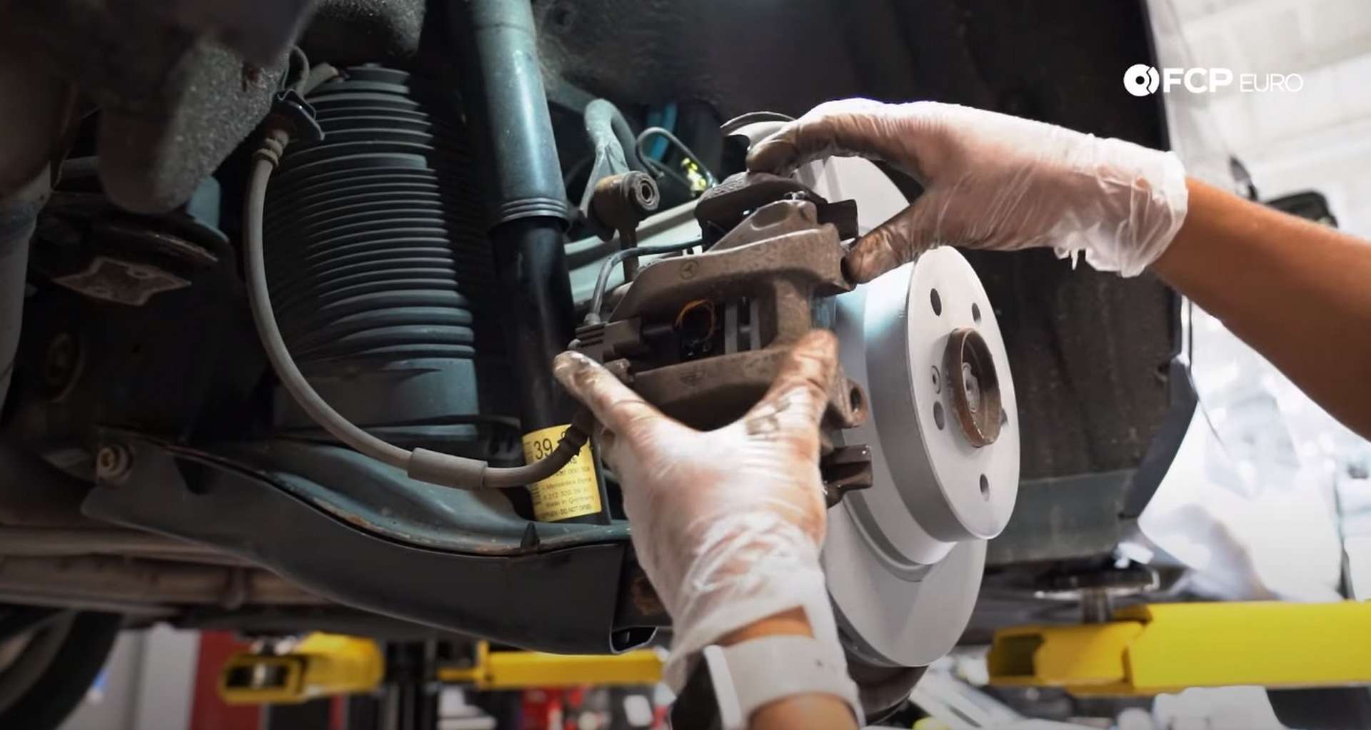 DIY Mercedes W211/212 Rear Brake Job installing the caliper
