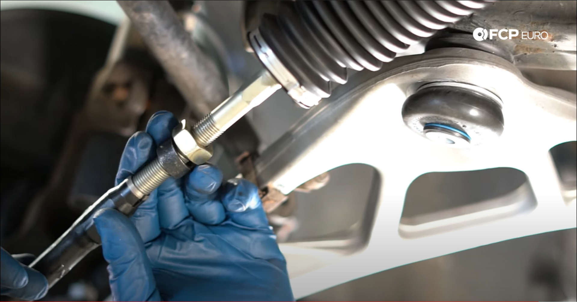 DIY BMW Front Suspension Refresh installing the tie rod end