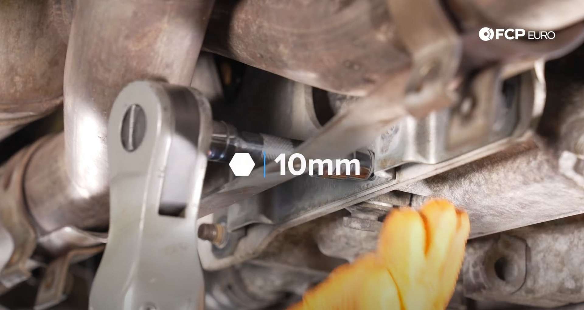 DIY Porsche 996 911 Water Pump And Thermostat Replacement removing lower alignment bracket