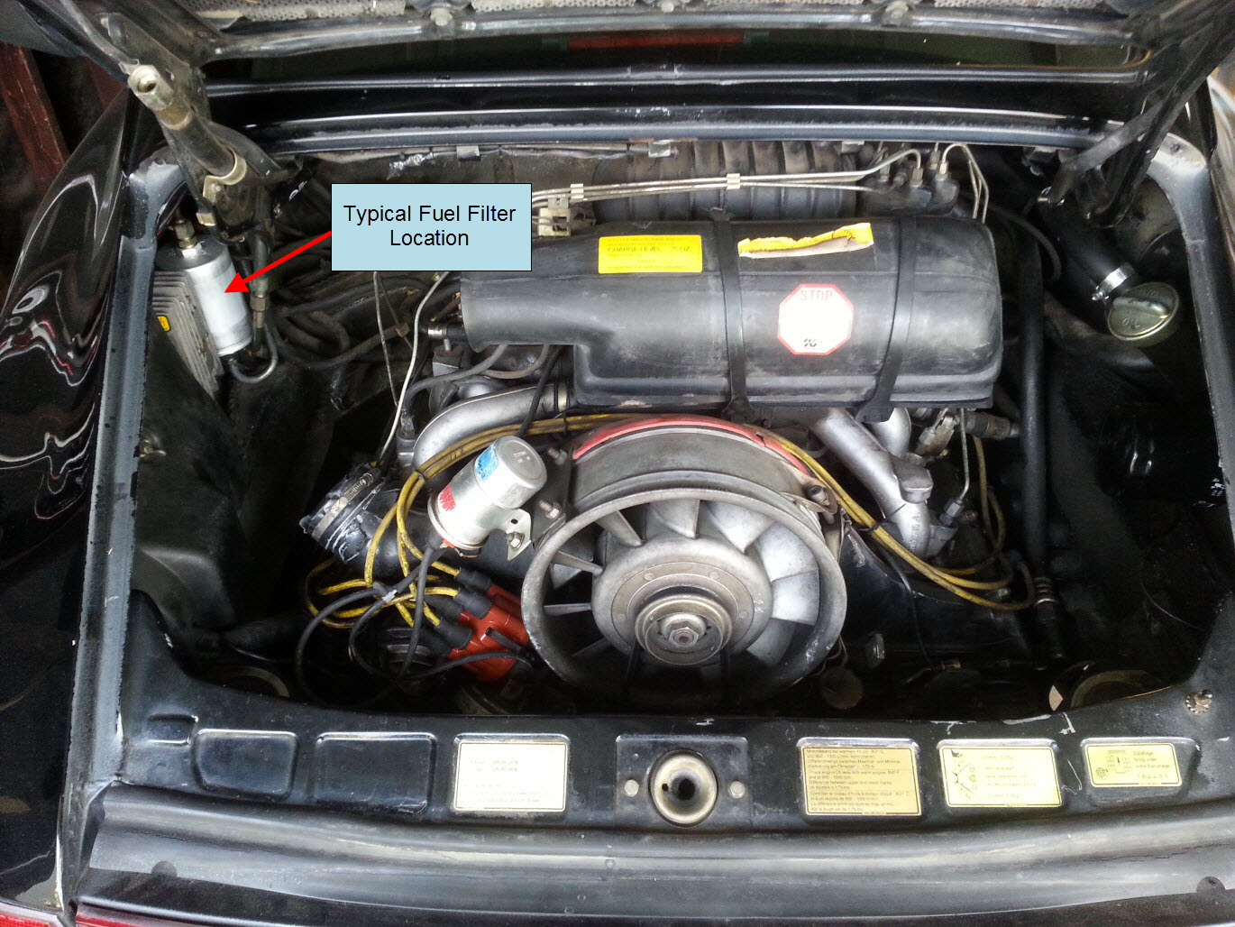 Porsche 911 fuel filter location in engine compartment.