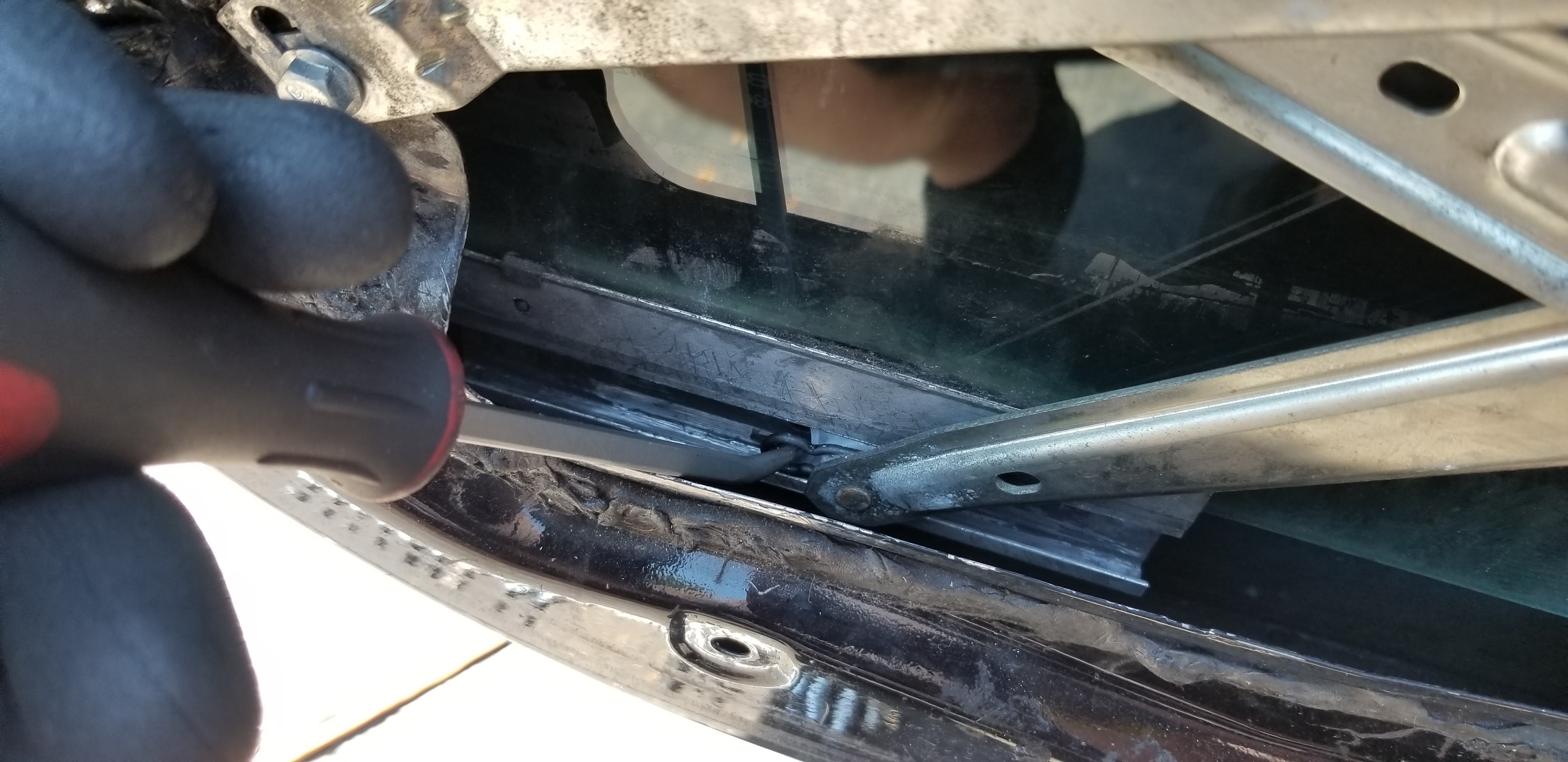 Step 3 - disconnect window from regulator