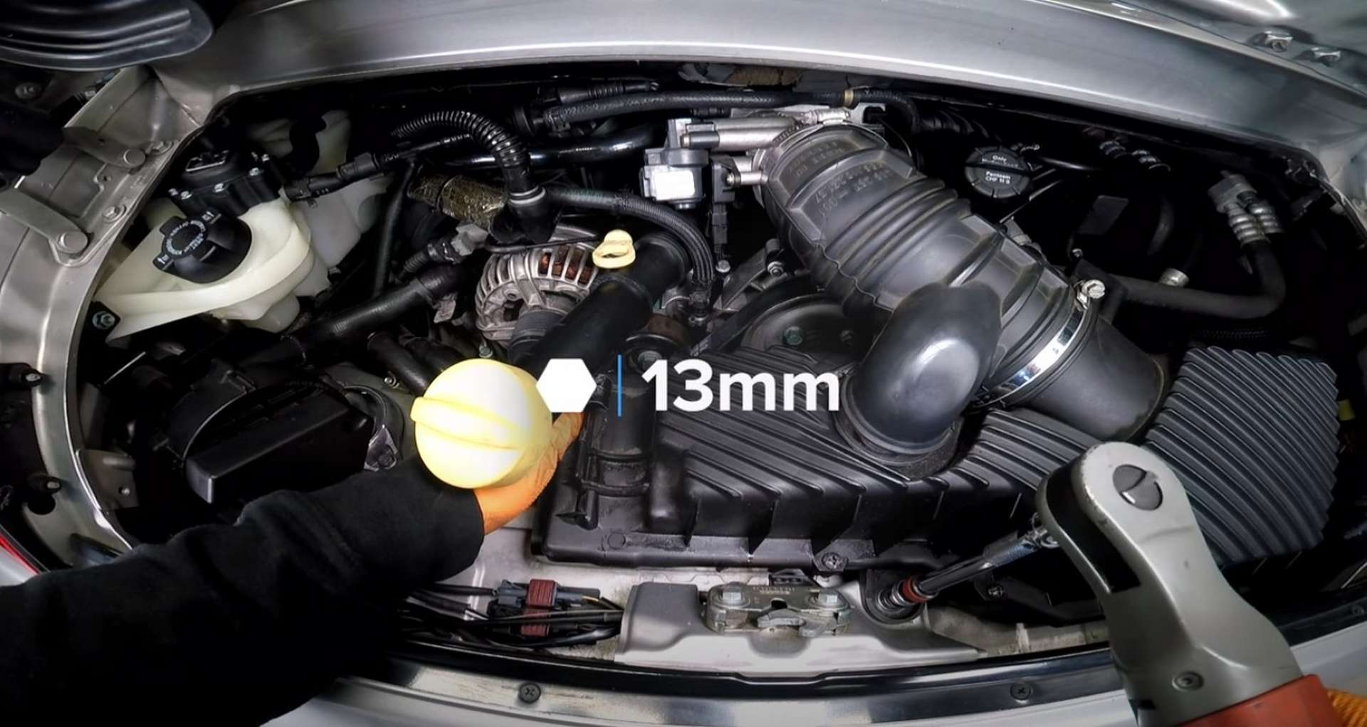 Porsche 996 Water Pump And Thermostat Replacement bolting the airbox in place