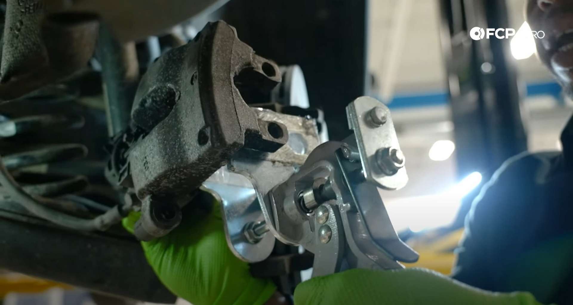 DIY Mercedes W205 Rear Brake Service compressing the piston