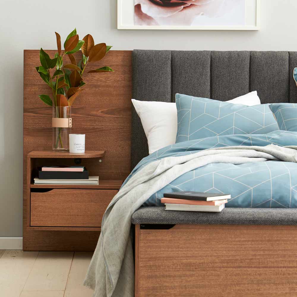 Bed with side table shop attached