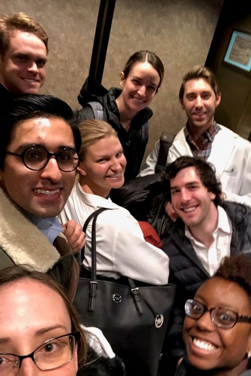 Group shot of Plastic Surgery residents getting cozy in an elevator