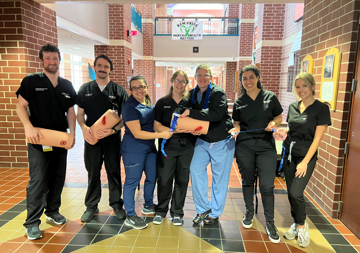 General Surgery residents participate in a Stop the Bleed Campaign for high school students