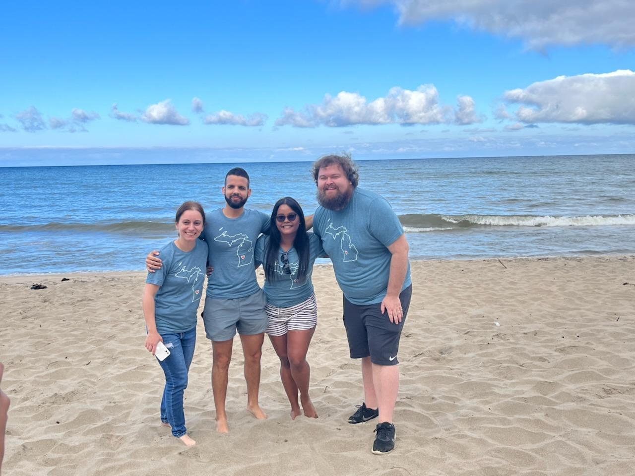 Group photo of Child Neurology Residents at a beach retreat