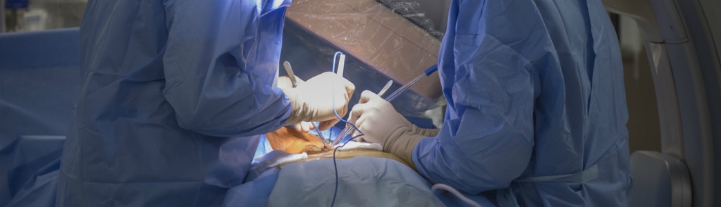 Surgeons working on a general surgery patient