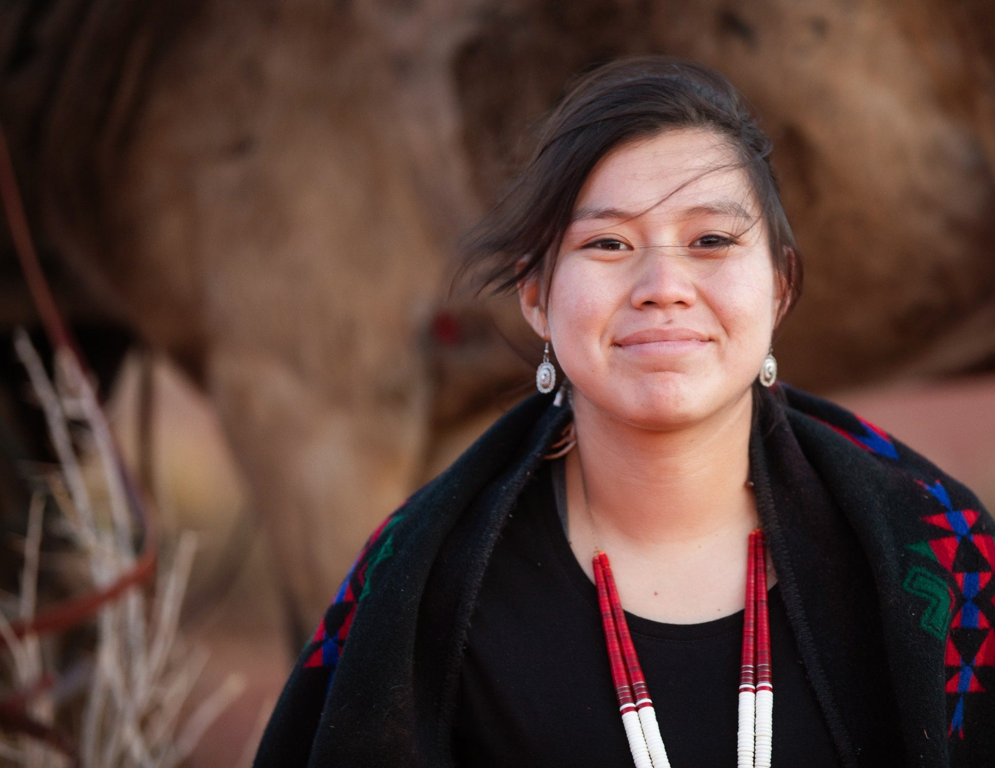 Native American woman smiling at the camera