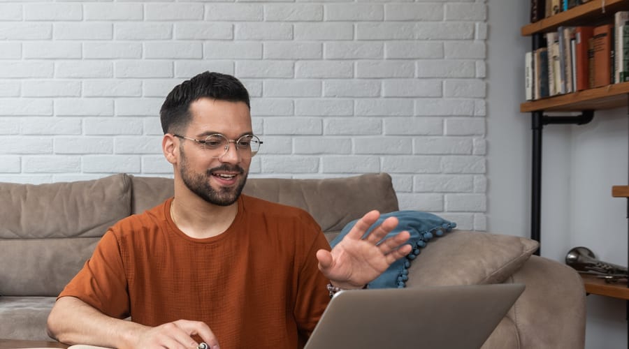 Colleagues in the office checking out Berlitz's AI tool that helps them learn to speak English confidently