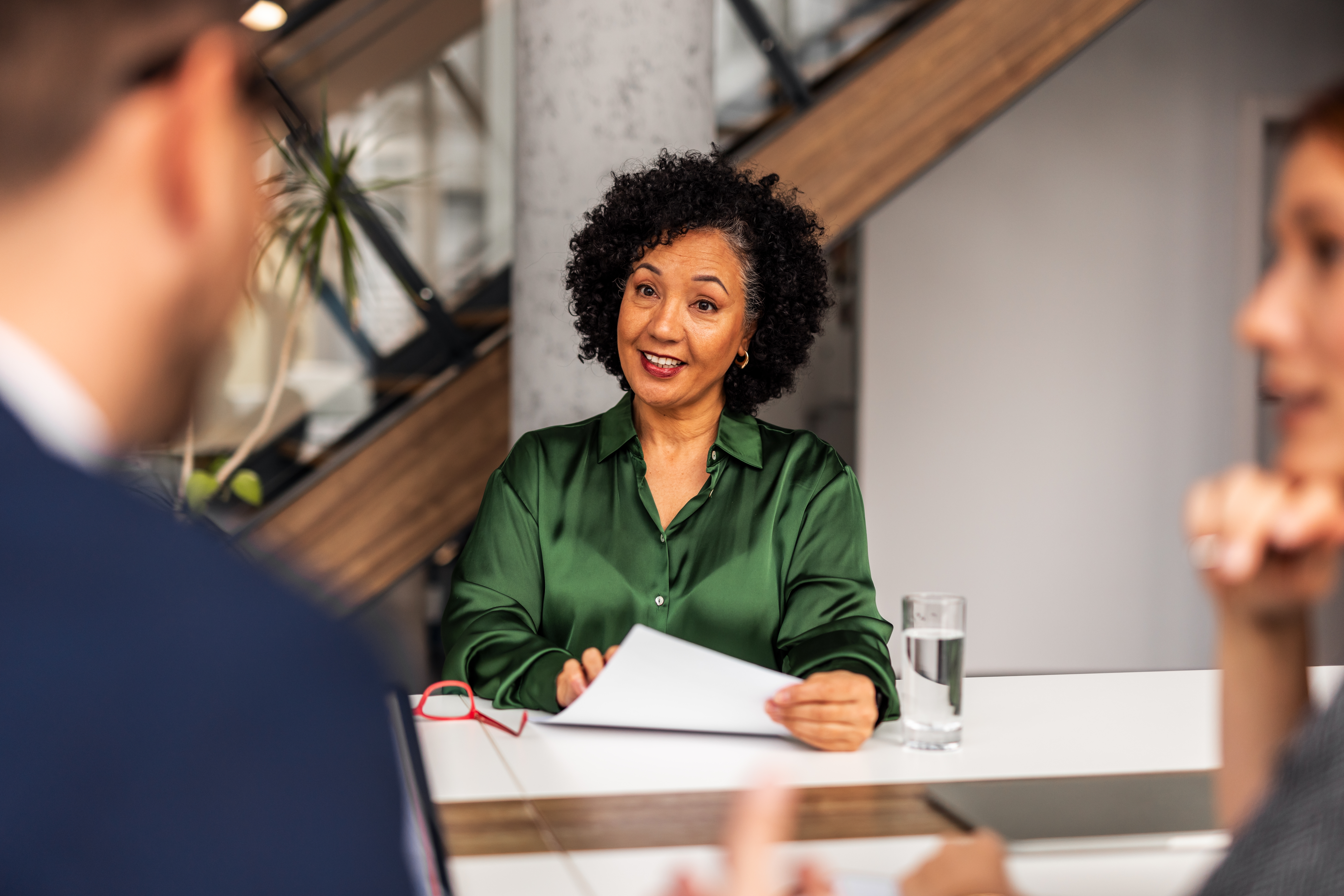 Woman talking to her instructor during an English course with Berlitz