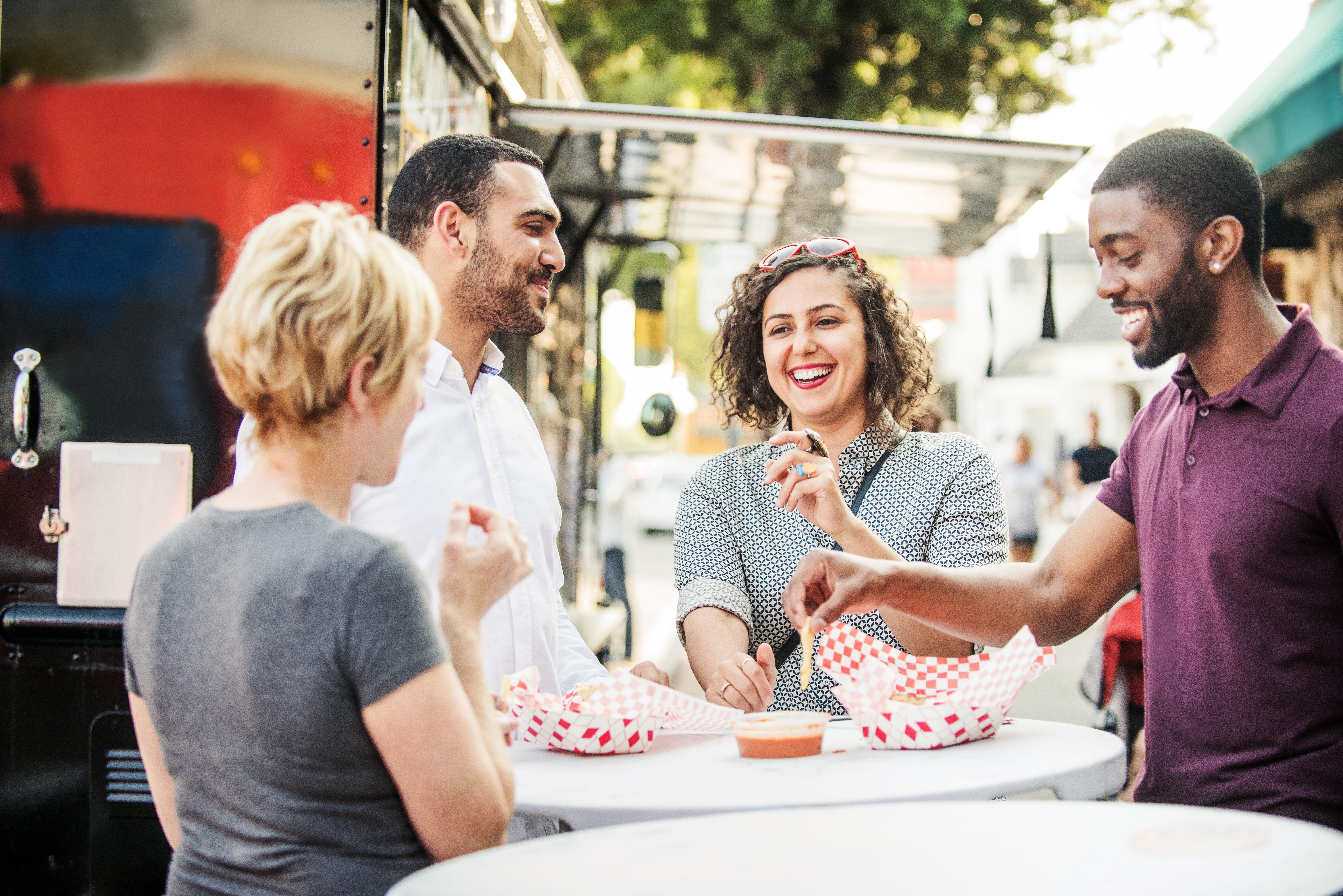 Group of students eating outside after their Spanish lesson