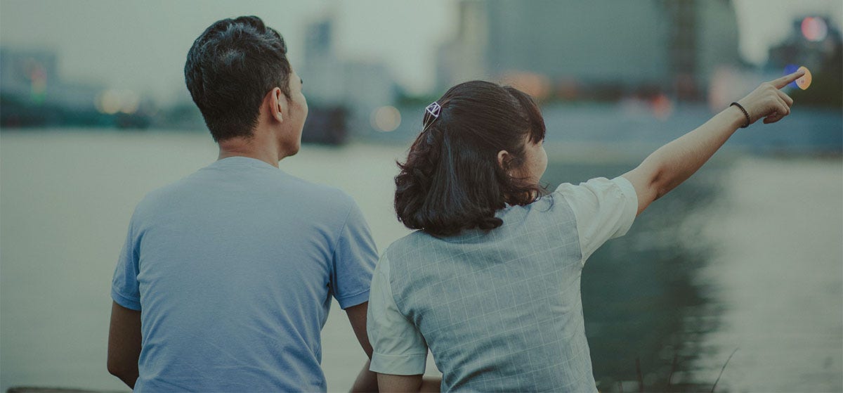 Couple in a new city checking out the sights