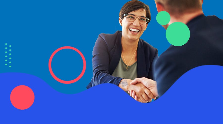 Woman shaking hands with a business partner