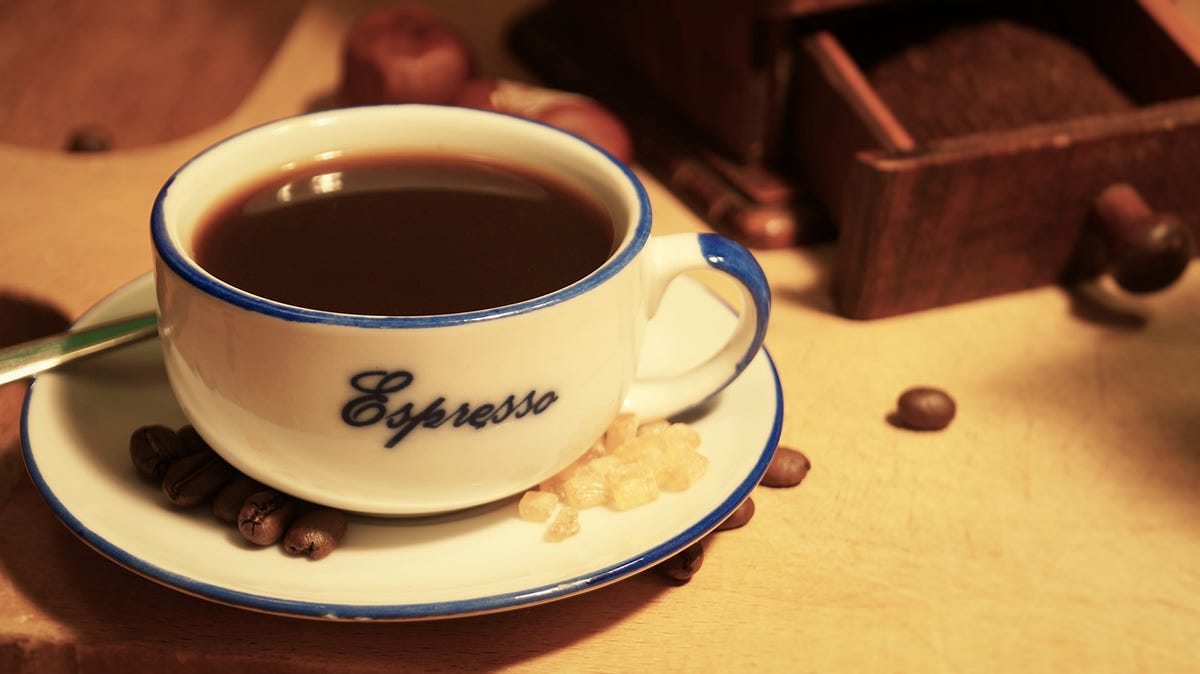 A cup of espresso on a table