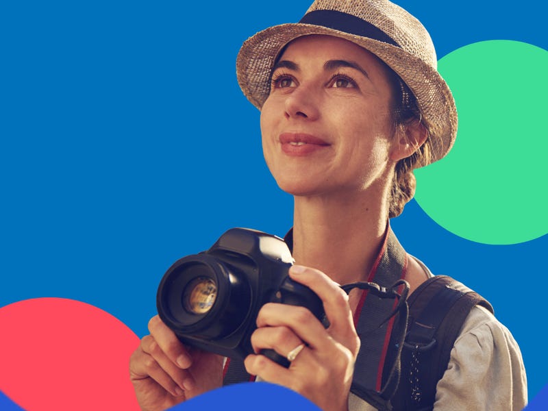 Woman with a camera in a foreign country