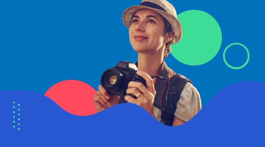 Woman with a camera in a foreign country