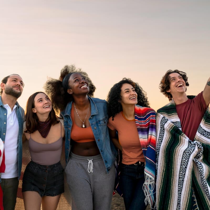 Friend group celebrating and hugging each other in the USA