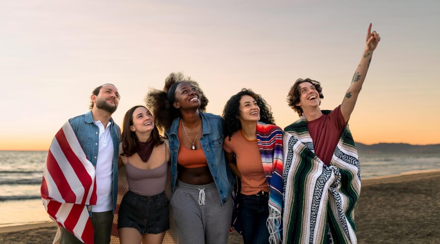 Friend group celebrating and hugging each other in the USA