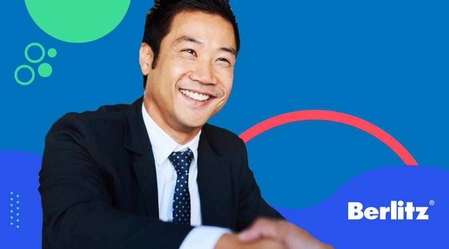 Man shaking hands with an HR person after a successful job interview