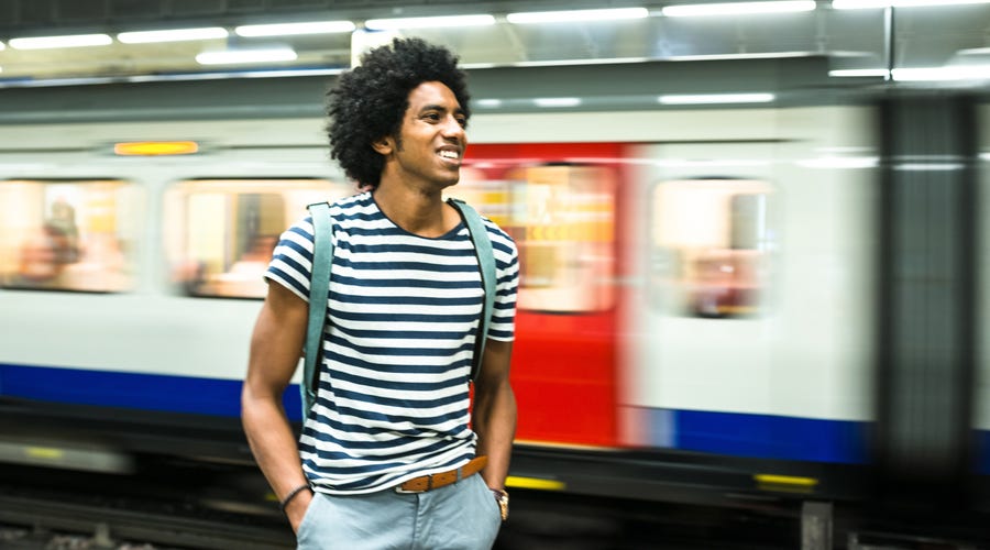 Man waiting for the metro after his online language course