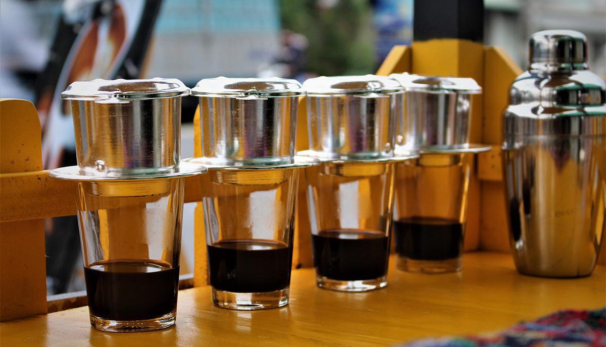 Traditional Vietnamese coffee in four glasses